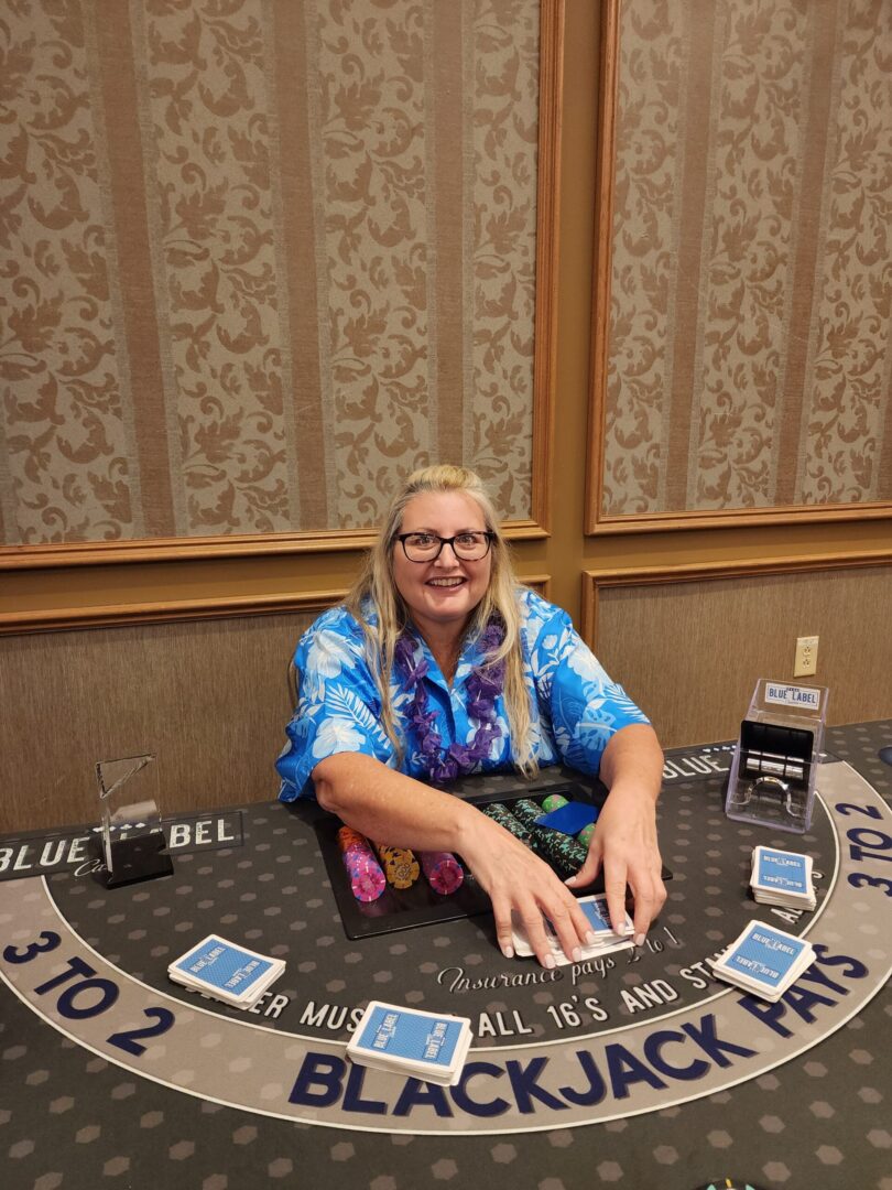 Our fabulous dealer at a blackjack table for rent